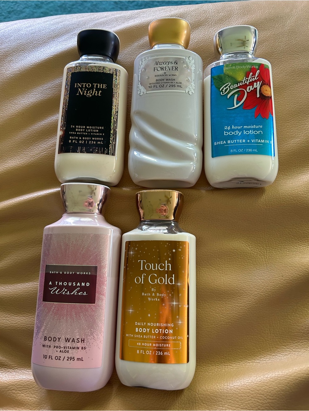 5 brand new never used Bath & Body Works body lotions. Touch of Gold Into Night